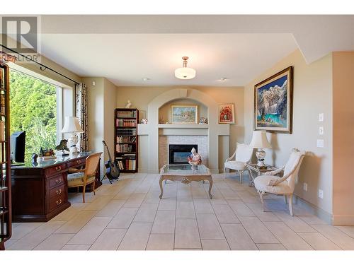 2376 Nahanni Court, Kelowna, BC - Indoor Photo Showing Living Room With Fireplace