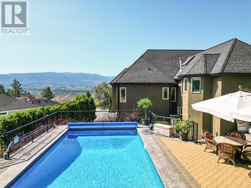 2376 Nahanni Court, Kelowna, BC - Outdoor With In Ground Pool With Deck Patio Veranda With Backyard