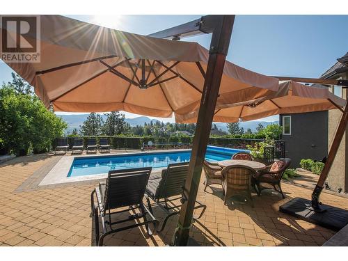 2376 Nahanni Court, Kelowna, BC - Outdoor With In Ground Pool With Deck Patio Veranda