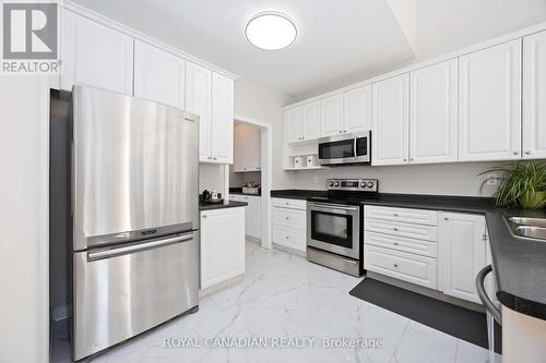 13 Lightheart Drive, Caledon, ON - Indoor Photo Showing Kitchen With Stainless Steel Kitchen With Double Sink