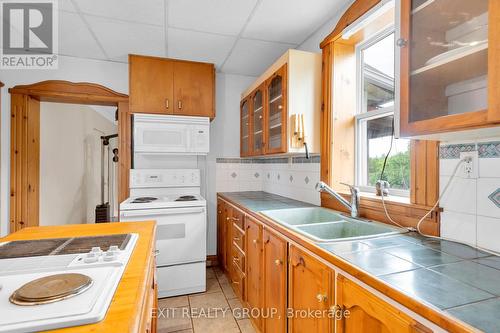 3123 County Road 2, Prince Edward County (Ameliasburgh), ON - Indoor Photo Showing Kitchen With Double Sink