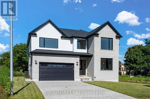 209 Merritt Court, North Middlesex (Parkhill), ON - Outdoor With Facade