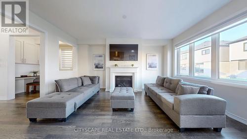 26 Carrie Crescent, Haldimand, ON - Indoor Photo Showing Living Room With Fireplace