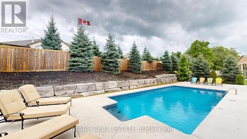 33 Woodside Drive, Brant (Brantford Twp), ON - Outdoor With In Ground Pool