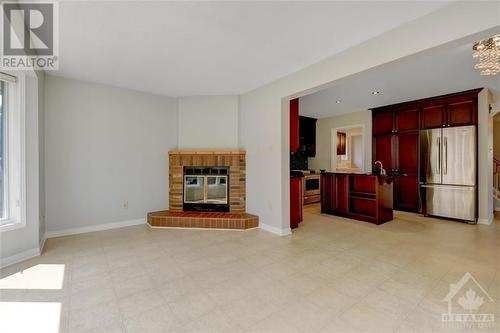 10 Brenda Crescent, Ottawa, ON - Indoor Photo Showing Living Room With Fireplace