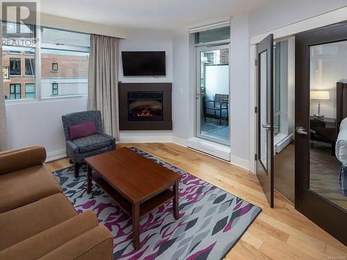 A212 810 Humboldt St, Victoria, BC - Indoor Photo Showing Living Room With Fireplace