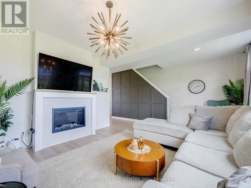 22 - 3380 Singleton Avenue, London, ON - Indoor Photo Showing Living Room With Fireplace