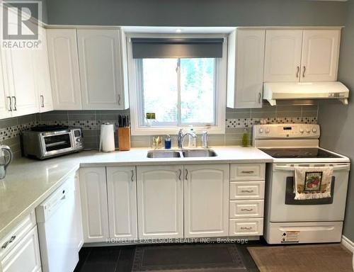 34 Abraham Avenue, Markham, ON - Indoor Photo Showing Kitchen With Double Sink