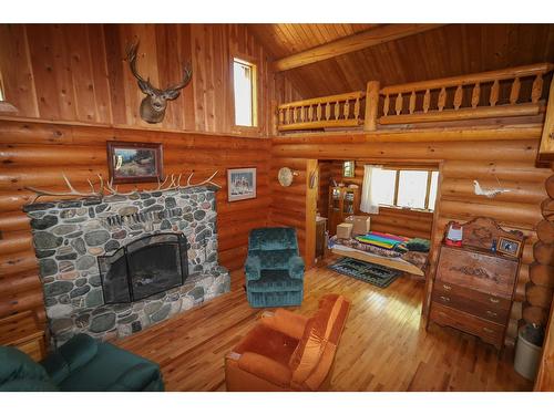 Null White Ram Forest Service Road, Skookumchuck, BC - Indoor Photo Showing Living Room With Fireplace