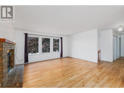 415 Canyon Street, Creston, BC - Indoor Photo Showing Living Room With Fireplace