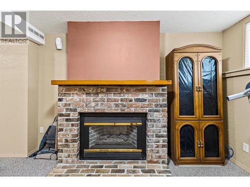 5931 40 Street Nw, Salmon Arm, BC - Indoor Photo Showing Living Room With Fireplace