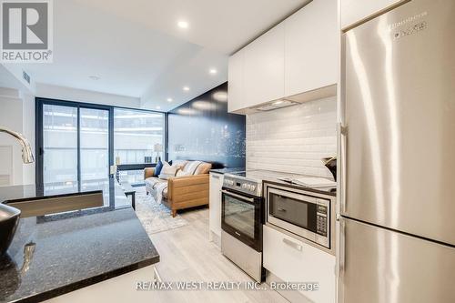 202 - 57 St Joseph Street, Toronto, ON - Indoor Photo Showing Kitchen With Stainless Steel Kitchen