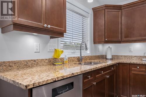 761 Rempel Cove, Saskatoon, SK - Indoor Photo Showing Kitchen With Double Sink