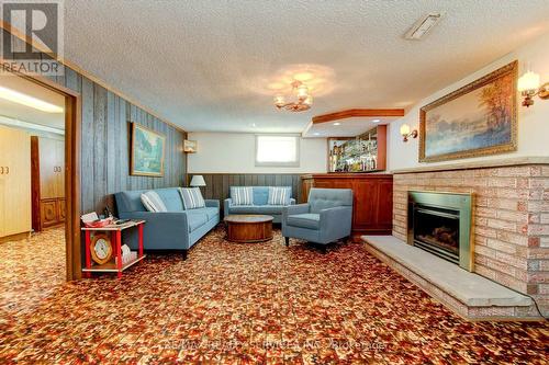 42 Mallard Crescent, Brampton (Central Park), ON - Indoor Photo Showing Living Room With Fireplace