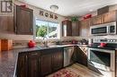 2052 Atkinson Street, Penticton, BC  - Indoor Photo Showing Kitchen With Double Sink 