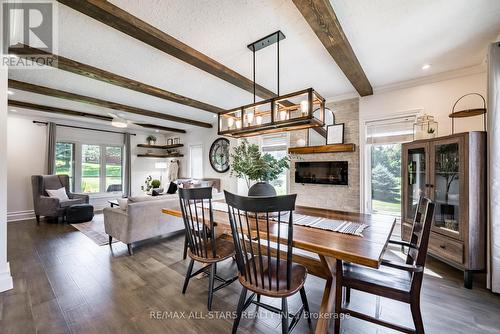 21750 Brunon Avenue, Scugog (Port Perry), ON - Indoor Photo Showing Dining Room With Fireplace