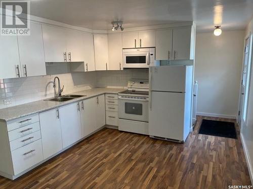 652 102Nd Street, North Battleford, SK - Indoor Photo Showing Kitchen With Double Sink