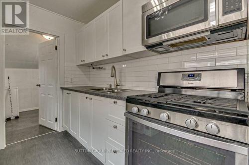 90 Delaware Street, London, ON - Indoor Photo Showing Kitchen With Double Sink