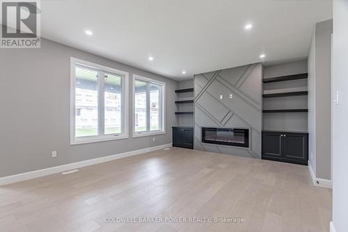 2688 Heardcreek Trail, London, ON - Indoor Photo Showing Other Room With Fireplace