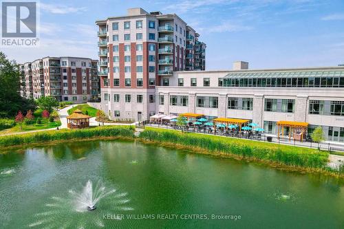 101 - 400 William Graham Drive, Aurora, ON - Outdoor With Body Of Water With Facade