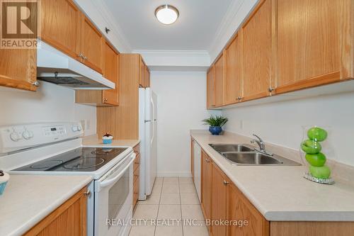 3406 - 4 Dayspring Circle, Brampton (Goreway Drive Corridor), ON - Indoor Photo Showing Kitchen With Double Sink