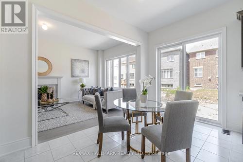 46 Dotchson Avenue, Caledon, ON - Indoor Photo Showing Dining Room With Fireplace