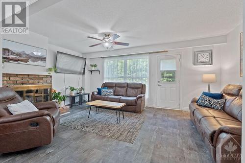 30 Carmichael Court, Ottawa, ON - Indoor Photo Showing Living Room With Fireplace