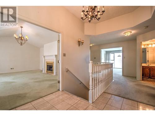 8109 Kalview Drive, Vernon, BC - Indoor Photo Showing Other Room With Fireplace