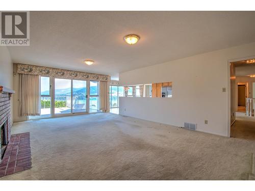 8109 Kalview Drive, Vernon, BC - Indoor With Fireplace