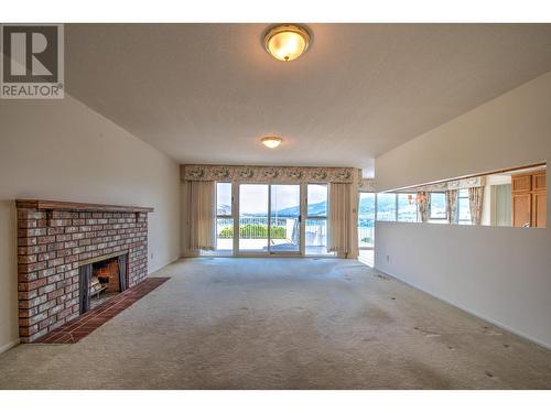 8109 Kalview Drive, Vernon, BC - Indoor Photo Showing Living Room With Fireplace