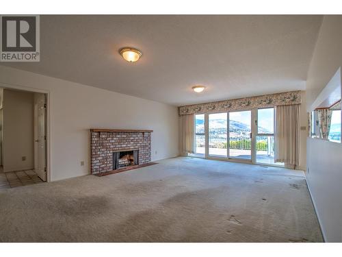 8109 Kalview Drive, Vernon, BC - Indoor Photo Showing Other Room With Fireplace