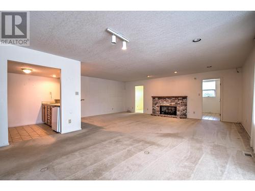 8109 Kalview Drive, Vernon, BC - Indoor With Fireplace