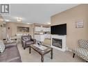 778 Rutland Road Unit# 402, Kelowna, BC  - Indoor Photo Showing Living Room With Fireplace 