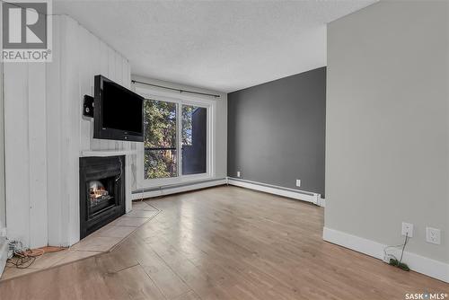 405 512 4Th Avenue N, Saskatoon, SK - Indoor With Fireplace