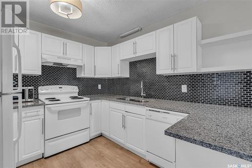 405 512 4Th Avenue N, Saskatoon, SK - Indoor Photo Showing Kitchen With Double Sink