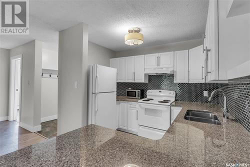 405 512 4Th Avenue N, Saskatoon, SK - Indoor Photo Showing Kitchen With Double Sink