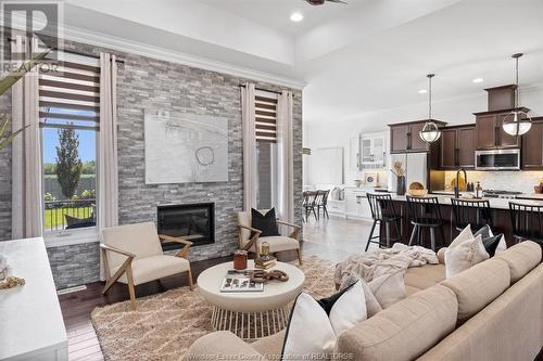 563 River Downs, Lakeshore, ON - Indoor Photo Showing Living Room With Fireplace