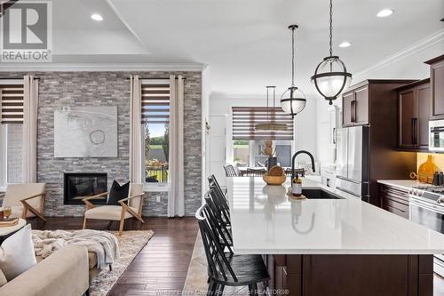 563 River Downs, Lakeshore, ON - Indoor Photo Showing Kitchen With Fireplace With Upgraded Kitchen