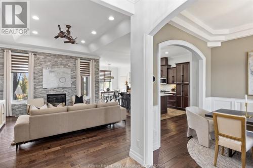 563 River Downs, Lakeshore, ON - Indoor Photo Showing Other Room With Fireplace