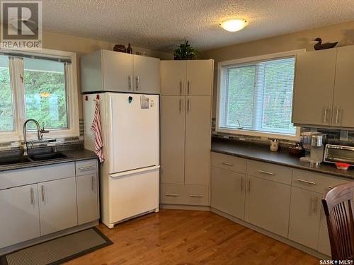 112 Birch Drive, Golden Sands, Turtle Lake, SK - Indoor Photo Showing Kitchen With Double Sink