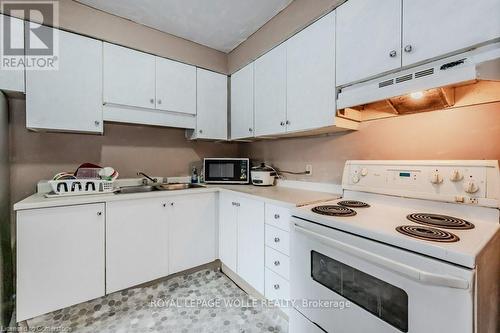 23 - 293 Fairway Road N, Kitchener, ON - Indoor Photo Showing Kitchen With Double Sink