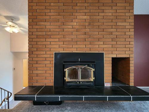 1239 Semlin Drive, Ashcroft, BC - Indoor Photo Showing Living Room With Fireplace