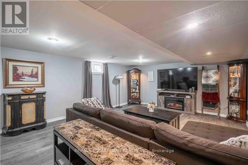 64 Melody Trail, St. Catharines, ON - Indoor Photo Showing Living Room With Fireplace