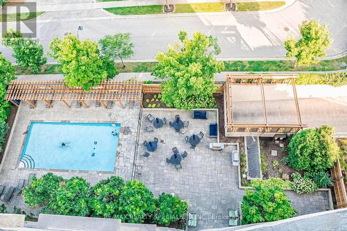 1107 - 2365 Central Park Drive, Oakville (Uptown Core), ON - Outdoor With In Ground Pool