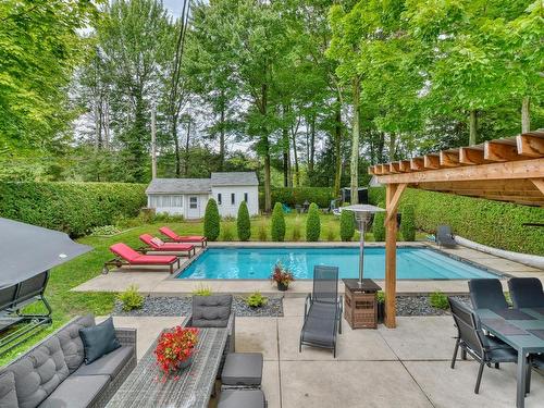 ExtÃ©rieur - 31 111E Avenue O., Blainville, QC - Outdoor With In Ground Pool With Deck Patio Veranda With Backyard