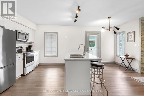 2069 - 90 Highland Drive, Oro-Medonte (Shanty Bay), ON - Indoor Photo Showing Kitchen With Double Sink