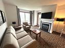 Living room - 427D-150 Ch. Au Pied-De-La-Montagne, Mont-Tremblant, QC  - Indoor Photo Showing Living Room With Fireplace 