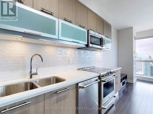 6901 - 388 Yonge Street, Toronto (Bay Street Corridor), ON - Indoor Photo Showing Kitchen With Double Sink With Upgraded Kitchen