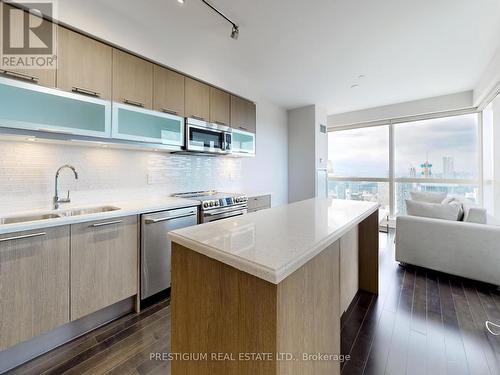 6901 - 388 Yonge Street, Toronto (Bay Street Corridor), ON - Indoor Photo Showing Kitchen With Double Sink