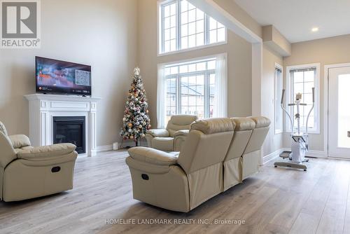 8 Venture Way, Thorold, ON - Indoor Photo Showing Living Room With Fireplace